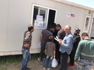 Laborers lining up to receive payment